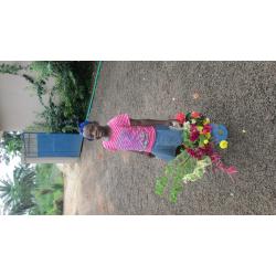 A little girl with flowers.JPG